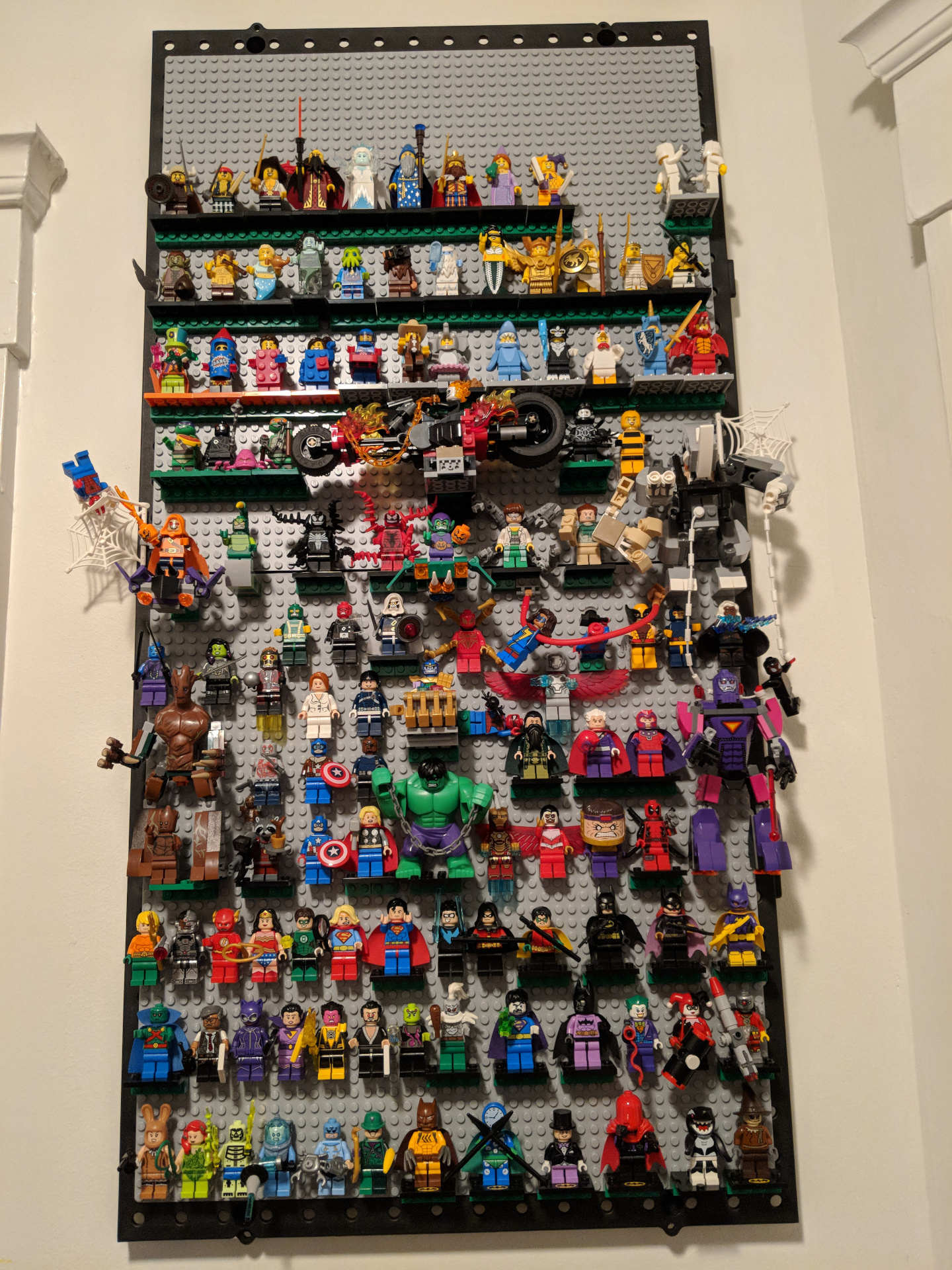 completed lego minifig wall with minifigs